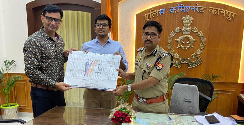 Handing-over-the-YWA-calendar-to-Kanpur-Police-Commissioner-ywa-event