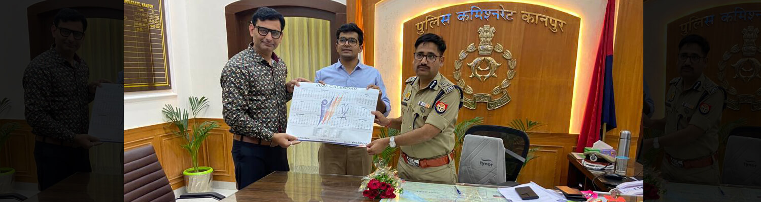 Handing over the YWA calendar to Kanpur’s Police Commissioner – Dr. Ram Krishna Swarnakar (IPS)